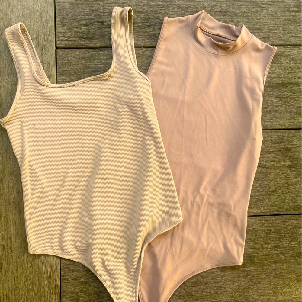 Bodysuit Set of 2. Mock Neck is Med. Ribbed is Large,fits like M/L